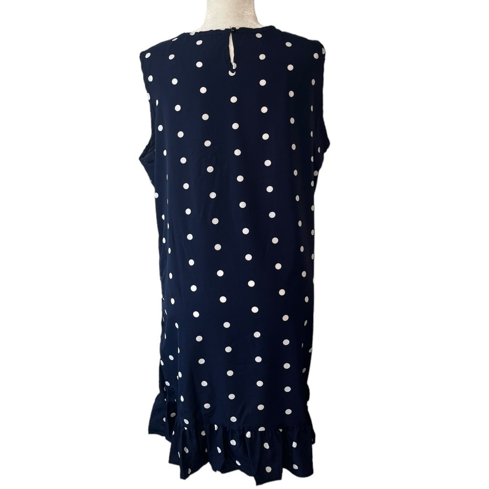 Navy and white sleeveless polkadot dress with ruffle bottom - Picture 3 of 7